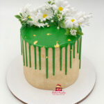 Birthday cake with flowers and drip